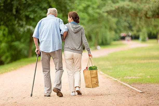 Caregiver helping senior at home