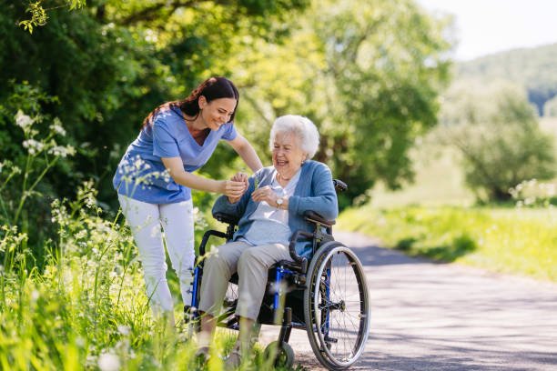 Caregiver and patient smiling